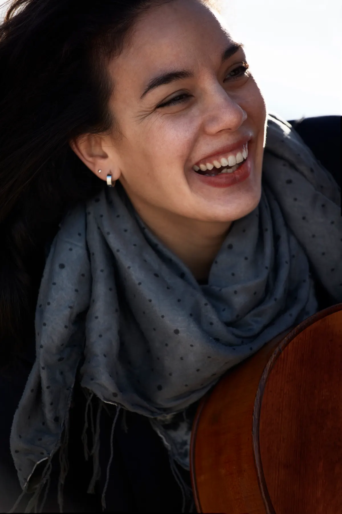 Woman laughing outdoors